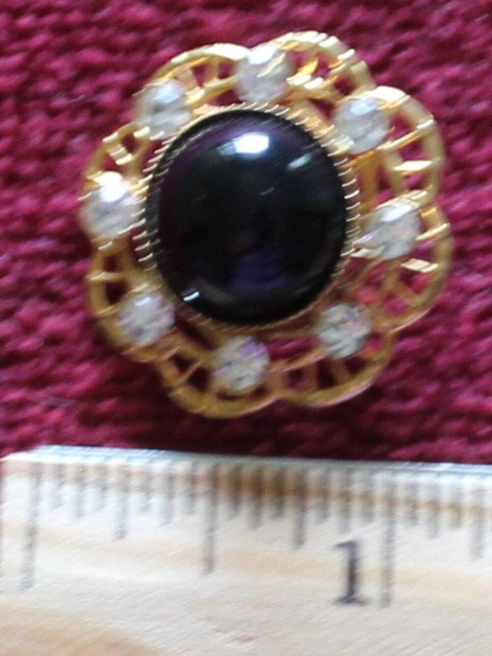 Vintage-style gold-tone round filigree brooch
